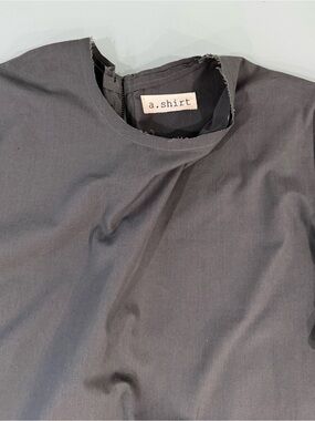 Dark grey blouse with ruched puff sleeves. Made in Italy.Size L.